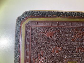 A pair of Chinese black and red cinnabar lacquer square dishes, Qianlong mark and of the period